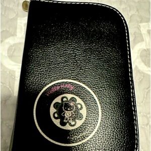 MAC Cosmetics Hello Kitty Brush set with case.